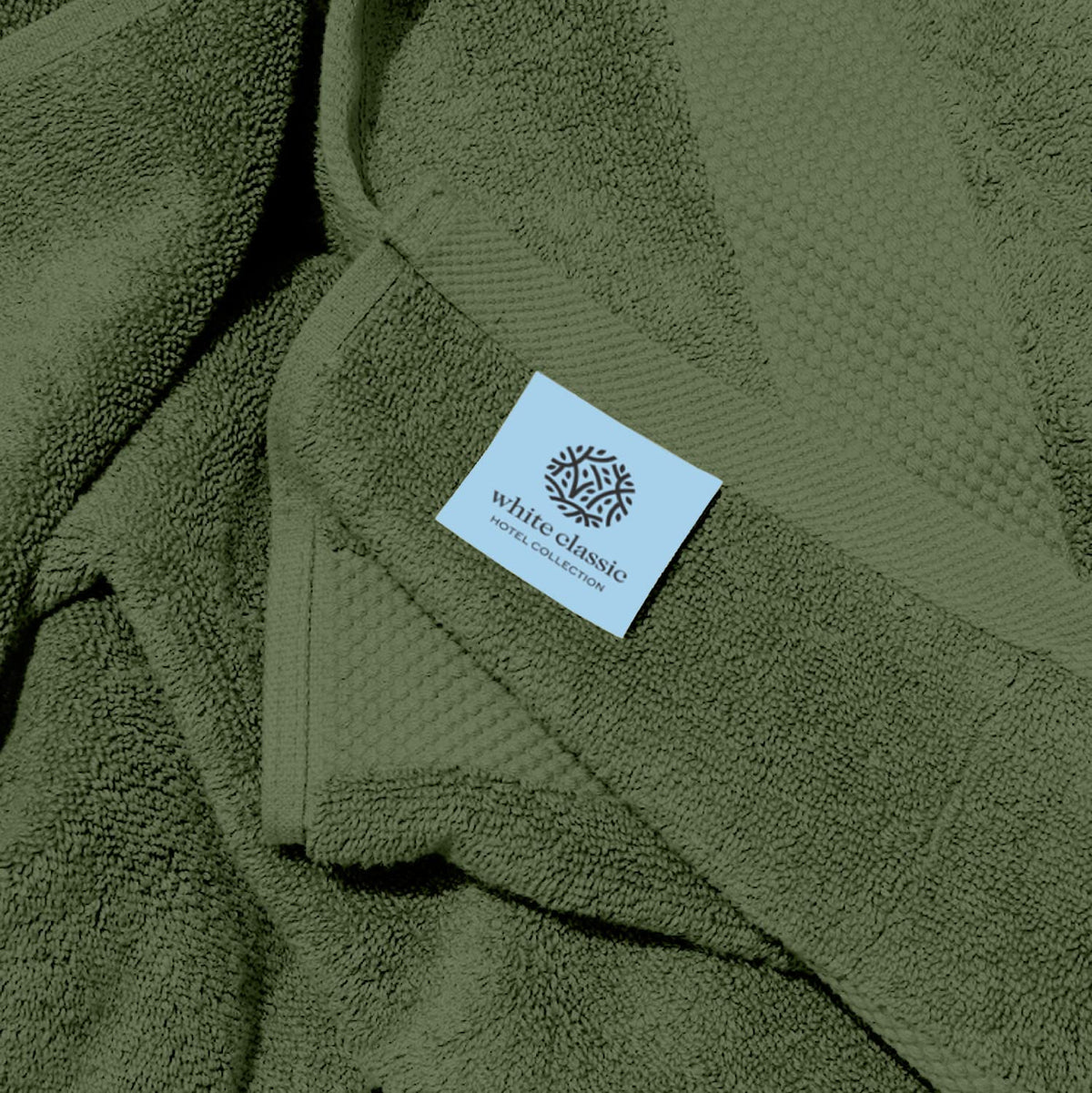 White Classic Luxury towel set fast-drying image shows towels exiting the bath ready for reuse.