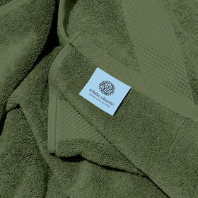 White Classic Luxury towel set fast-drying image shows towels exiting the bath ready for reuse.