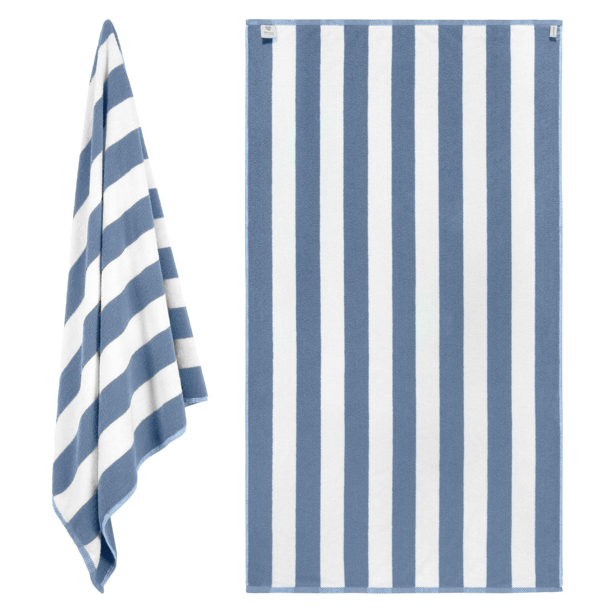 White Classic oversized beach towel laid out on sand for sunbathing