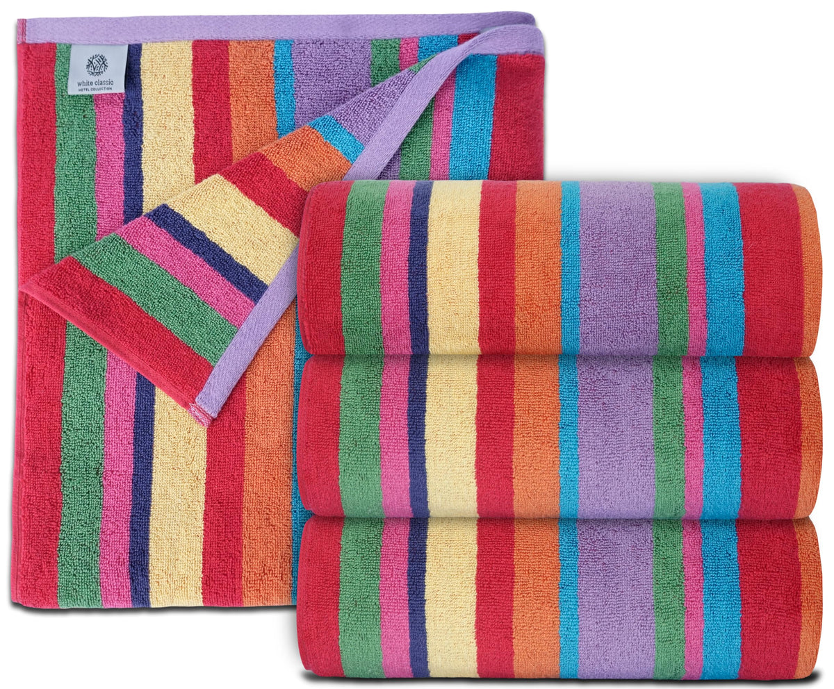 White Classic oversized rainbow-stripe towel ideal for poolside lounging.