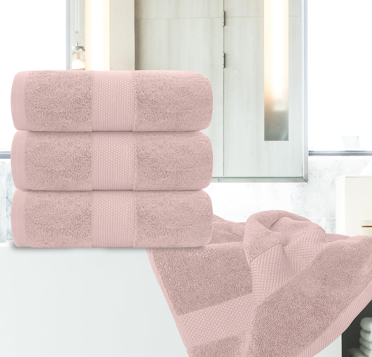 White Classic pink towels demonstrating quick-dry performance after a shower.