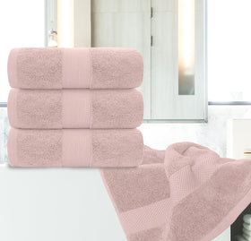 White Classic pink towels demonstrating quick-dry performance after a shower.