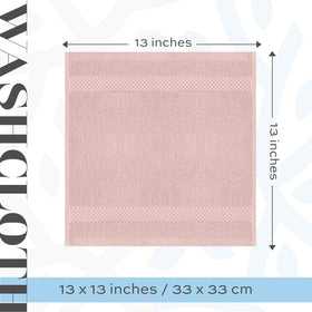 White Classic pink washcloths in a bathroom setting with spa-like softness.