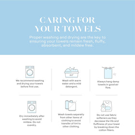White Classic beach-ready towels near bath area for poolside relaxation