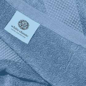 White Classic double-needle stitched towels resist fraying for ongoing performance.