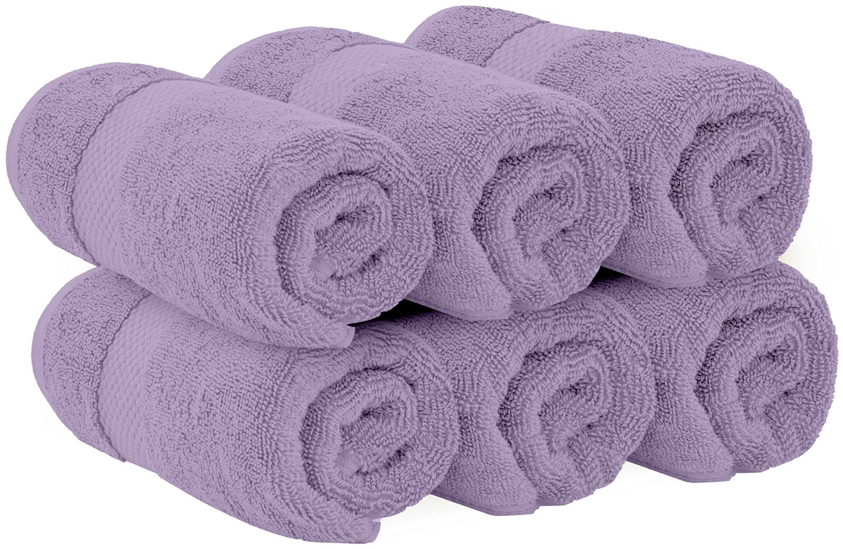 Folded White Classic Lavender towels arranged for spa-like bathroom ambiance.