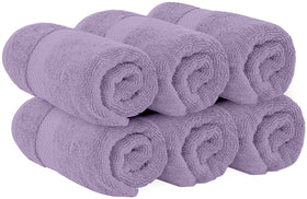 Folded White Classic Lavender towels arranged for spa-like bathroom ambiance.