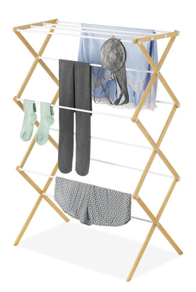 Whitmor foldable drying rack with accordion design for space-saving storage.