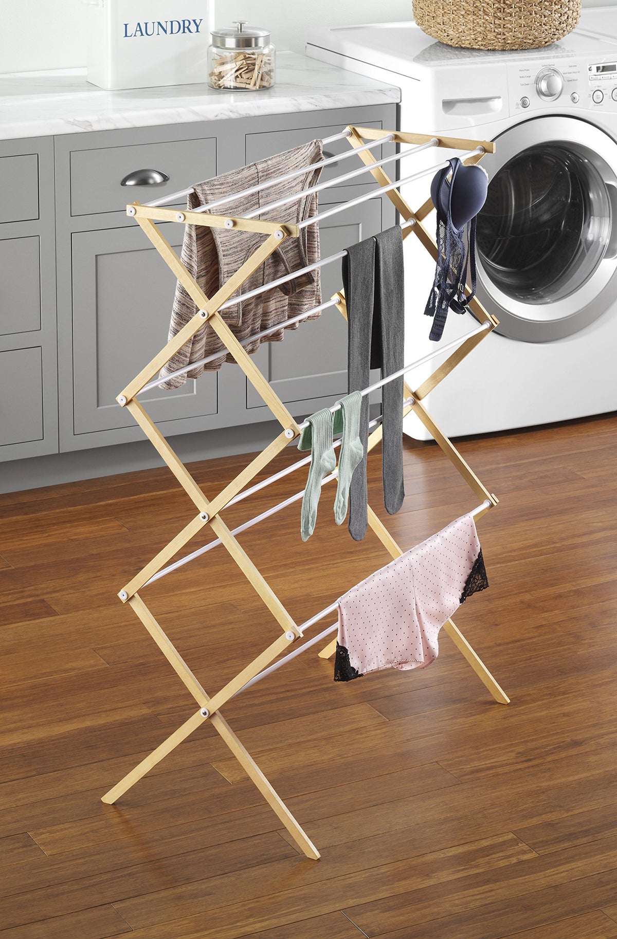 Whitmor natural wood drying rack top shelf for hanging or air-drying.