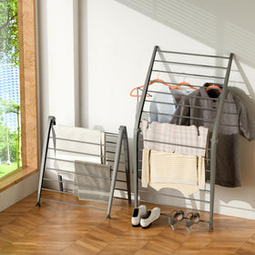 Whitmor Spacemaker Folding Drying Rack leaning against a wall for space-saving air-drying.