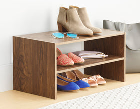 Whitmor walnut rack storing shoes neatly on a compact unit