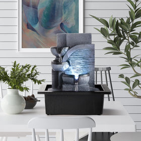 WICHEMI tabletop water fountain in desk setup showing easy plug‑in operation.