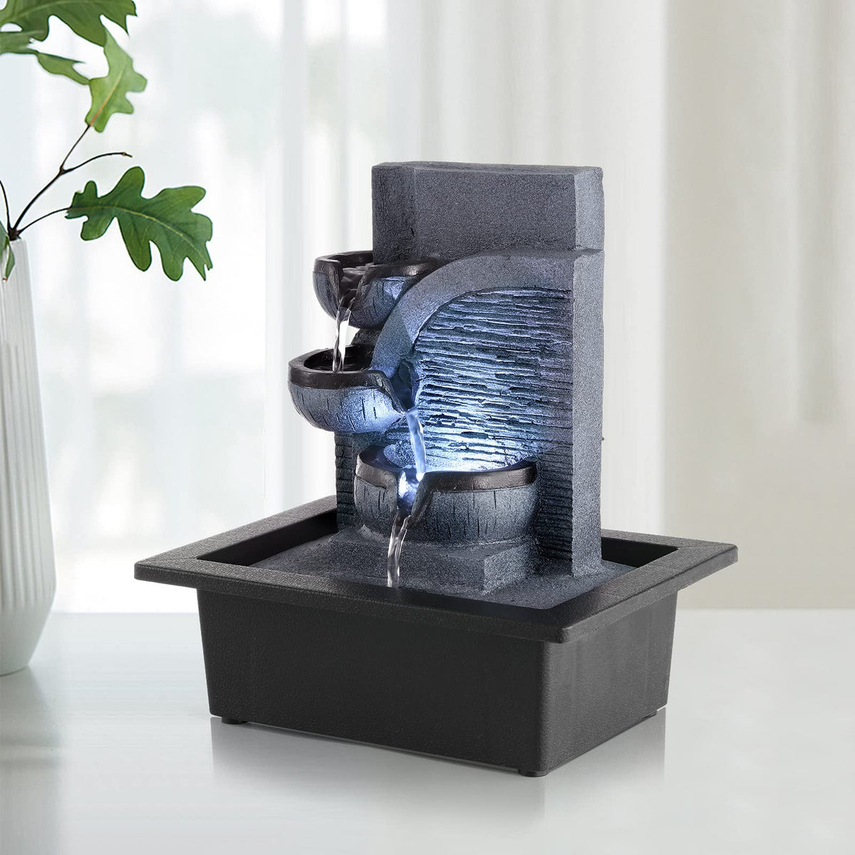WICHEMI tabletop water fountain dimensions 10.6 by 9.1 by 6.9 inches for fitting spaces.