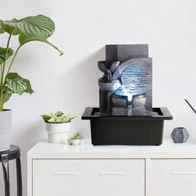 WICHEMI tabletop water fountain LED light illuminates cascading tiers for calming ambiance.