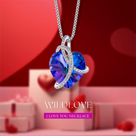 WILDLOVE heart-shaped crystal necklace nestled in the rose box drawer