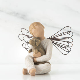 Willow Tree Angel of Comfort in cream onesie with brown dog, cozy home decor