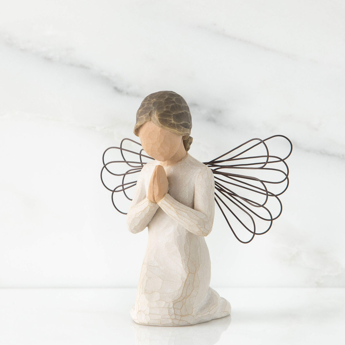 Willow Tree Angel of Prayer cream dress with wire wings, an elegant centerpiece.