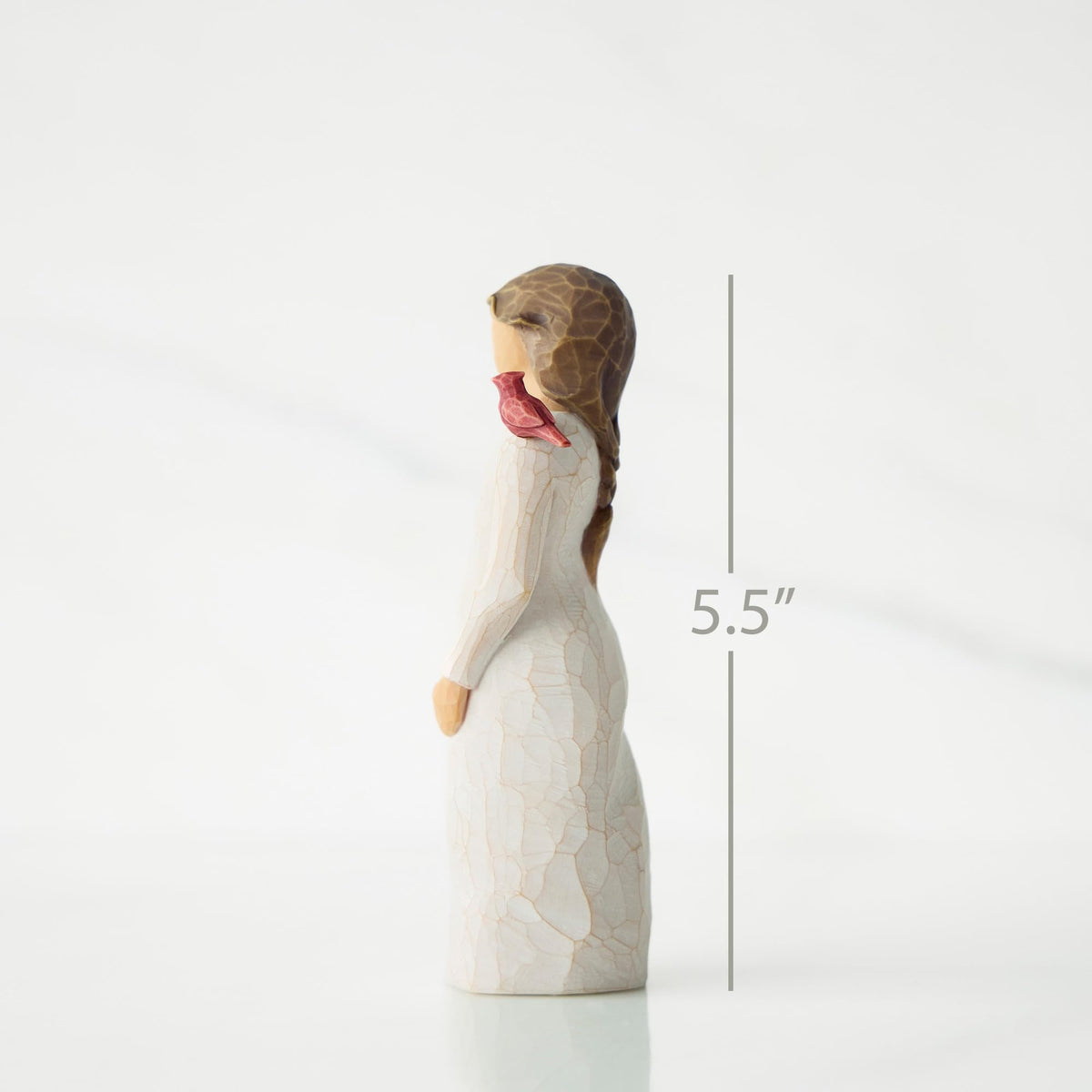 Willow Tree Messenger with cardinal on shoulder—symbol of enduring connection.