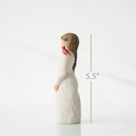 Willow Tree Messenger with cardinal on shoulder—symbol of enduring connection.