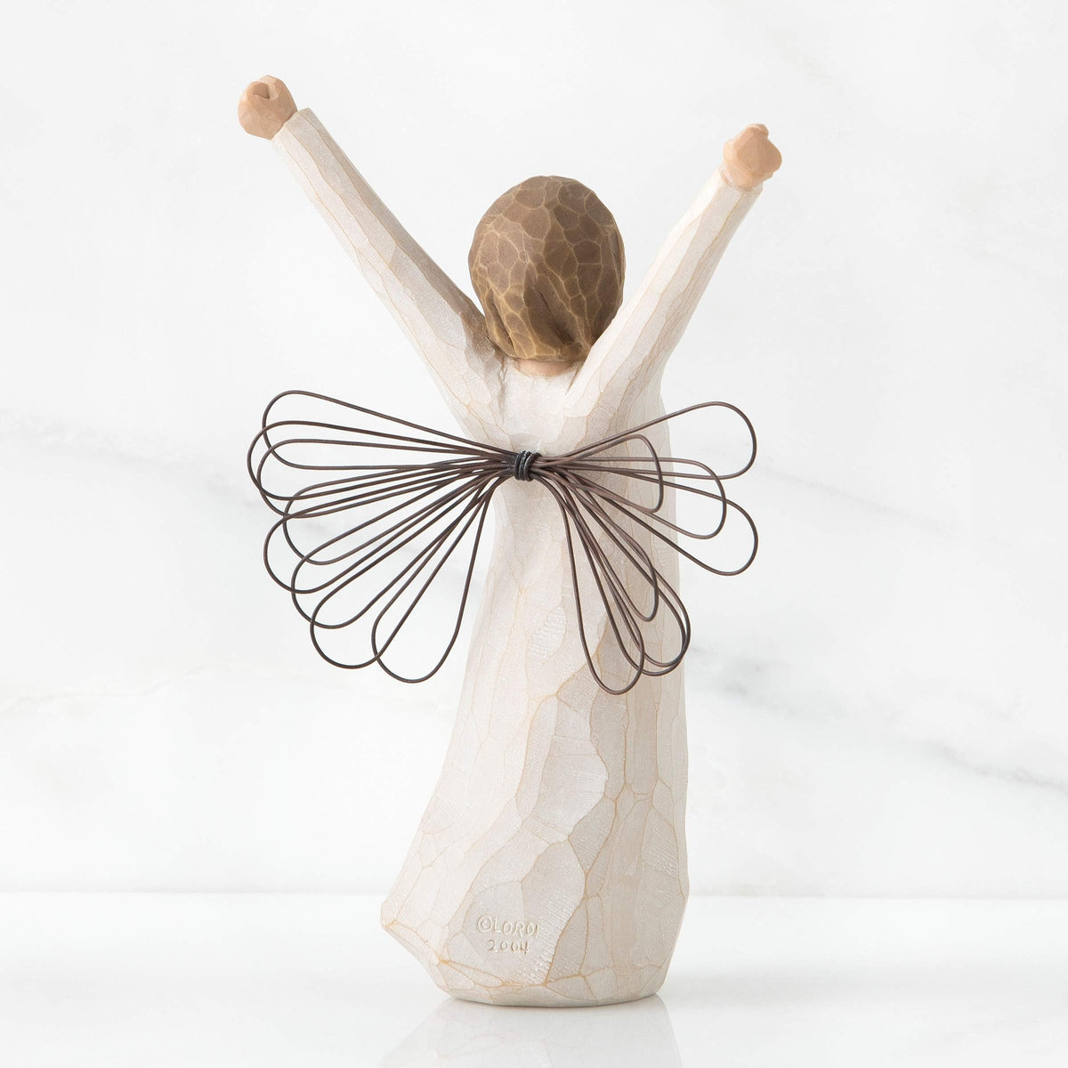 Willow Tree Courage Angel enclosure card with sentiment about courage and inspiration.