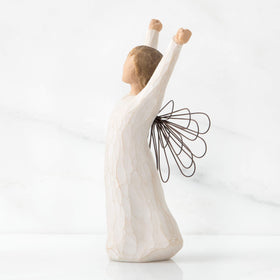 Willow Tree Courage Angel hand-painted resin, showcasing craftsmanship and collectible charm.