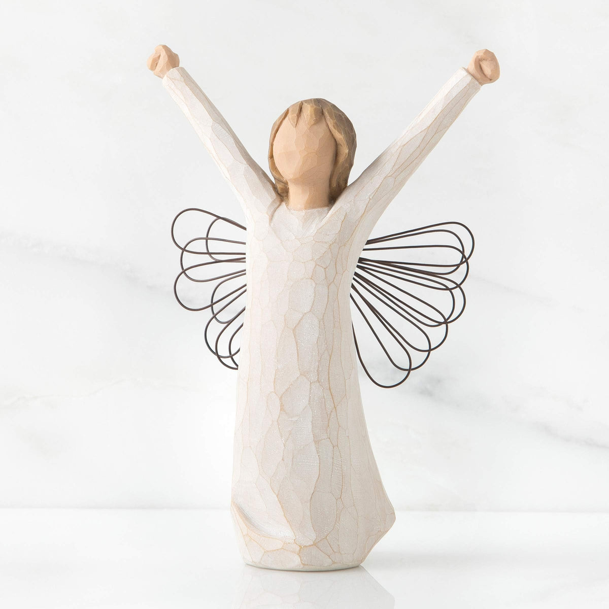 Willow Tree Courage Angel with upraised arms, a hopeful presence in any room.