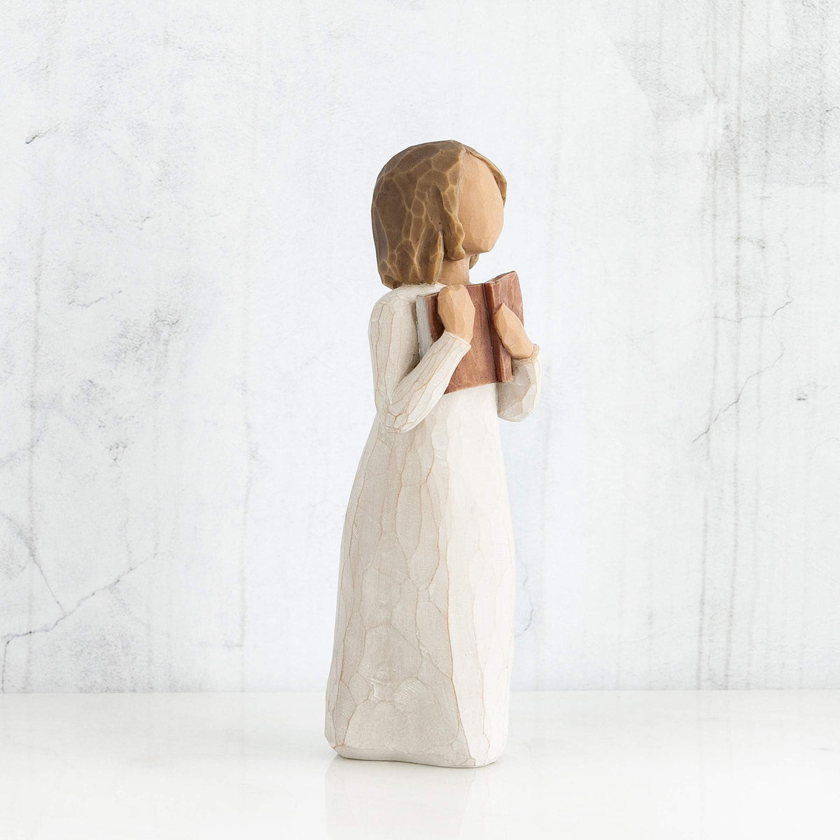 Willow Tree cream-dress standing figure holding an open book
