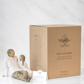 Willow Tree family grouping setup with related figures on display