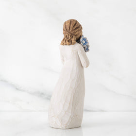 Willow Tree Forget-me-not figure on a table, ready for display and gifting
