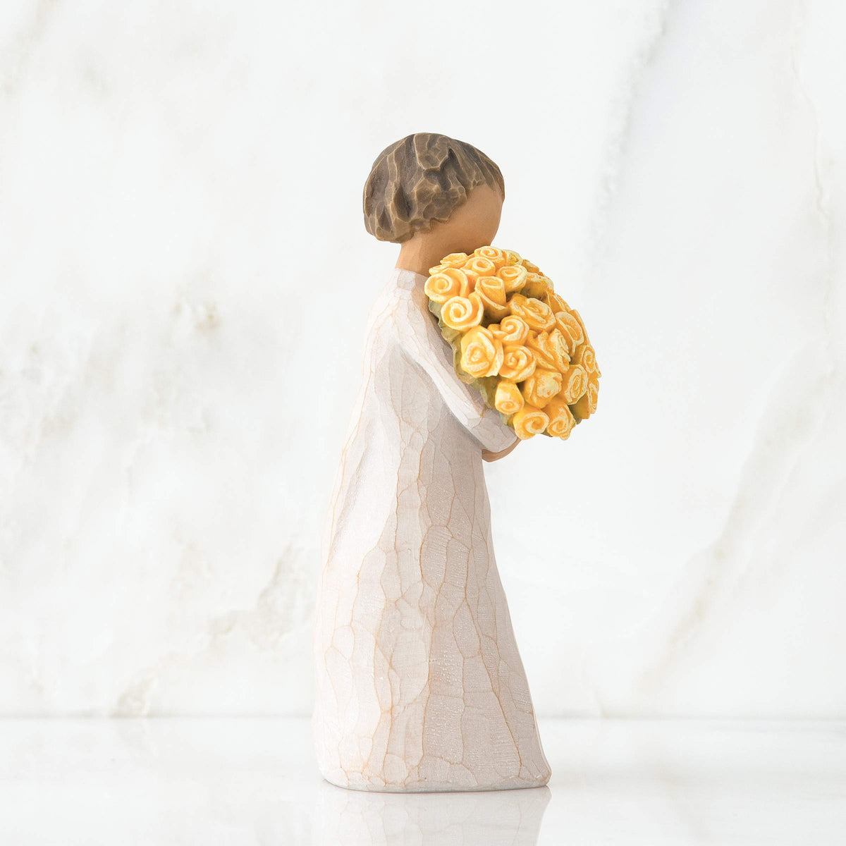 Willow Tree Good Cheer hand-painted resin sculpture reflecting handcrafted artistry.