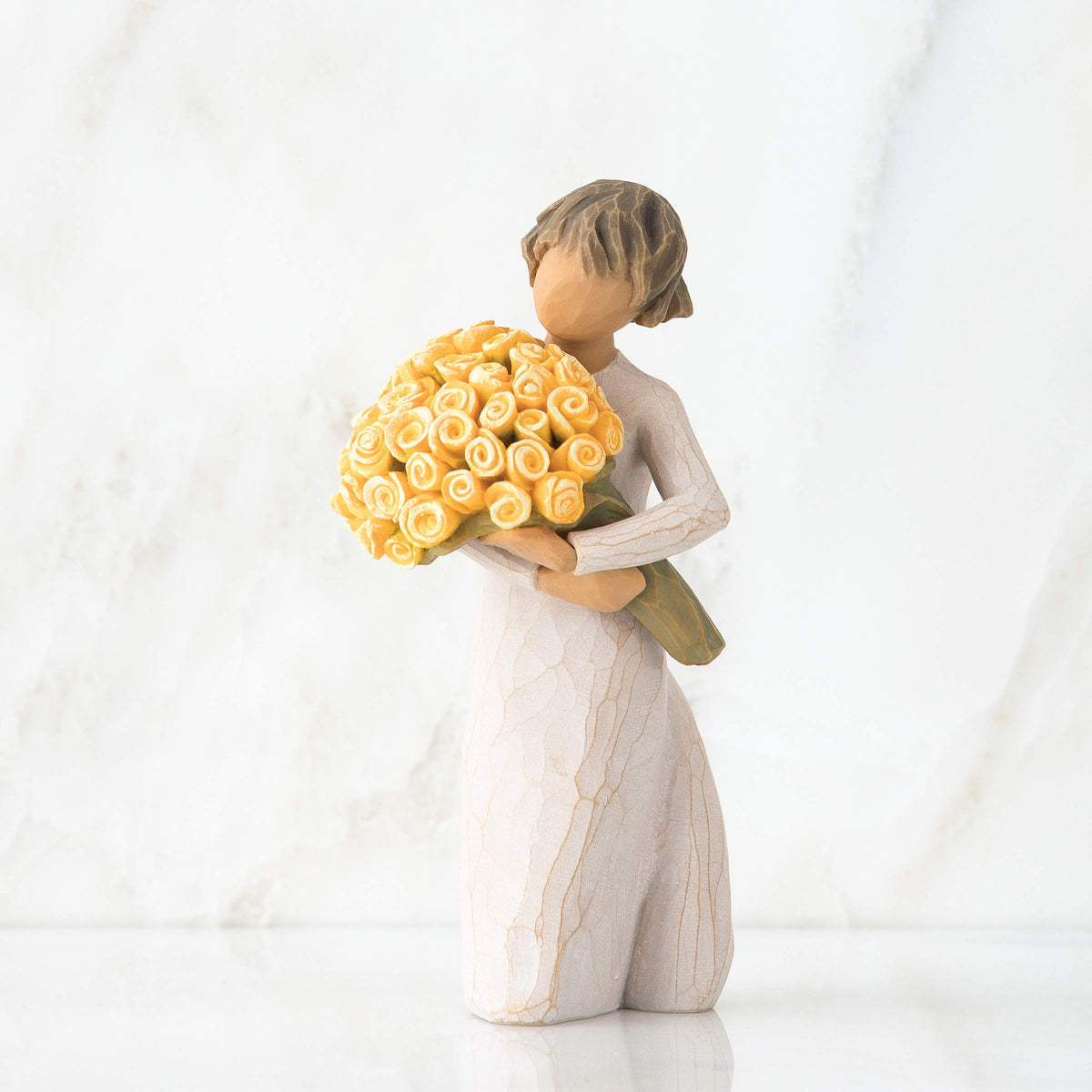 Willow Tree Good Cheer standing figure with yellow rose bouquet, perfect for display.
