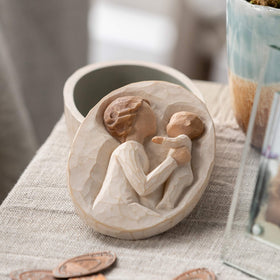 Care for Willow Tree Grandmother keepsake box with soft brush to dust.