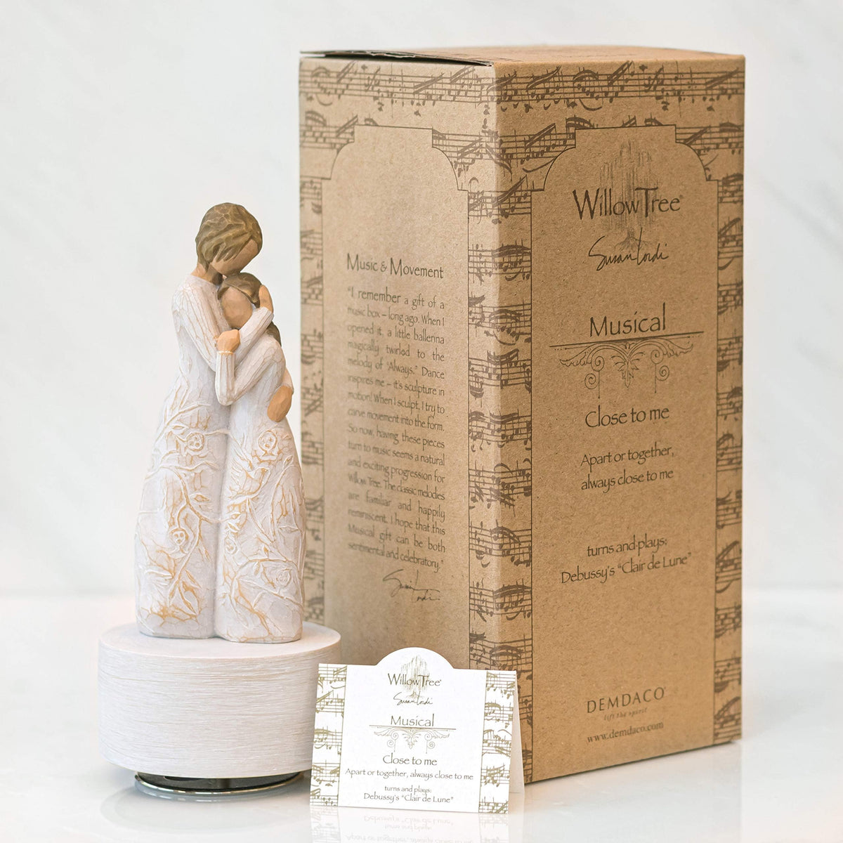 Willow Tree hand-painted cream dresses with vines ideal for shelf display.