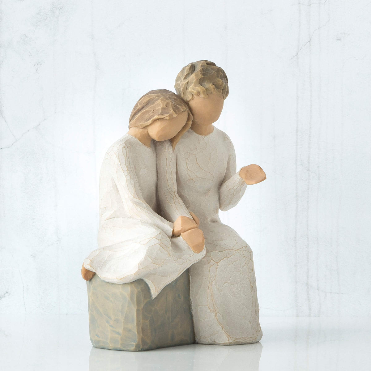 Willow Tree hand-painted resin figure detail showing craftsmanship and color.