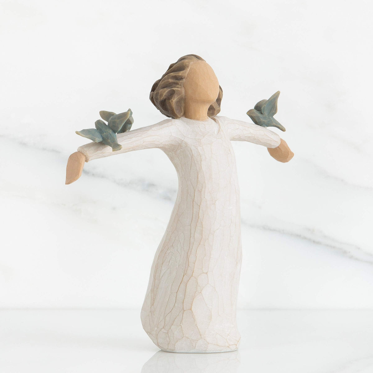 Willow Tree Happiness with three bluebirds on arms symbolizes encouragement.