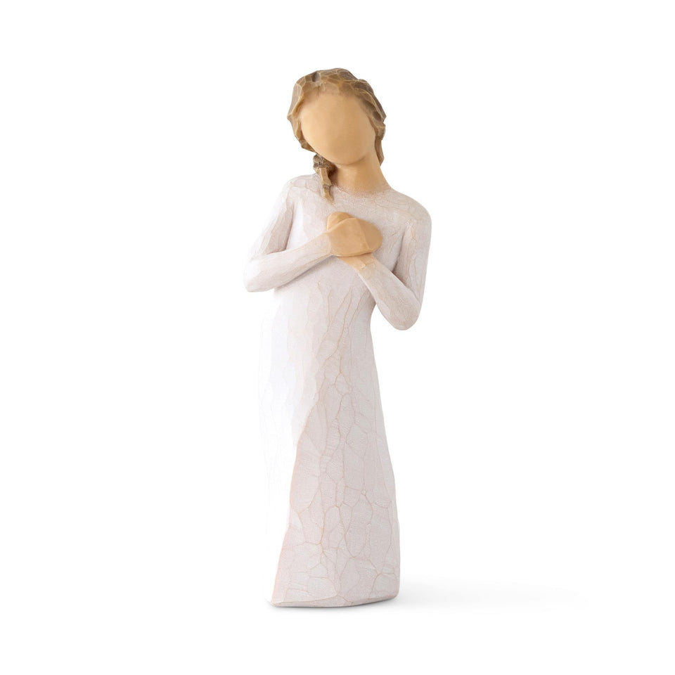 Willow Tree Here for You figure with hands to heart provides a comforting presence on display.