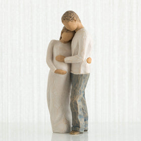 Willow Tree Home figure, pregnant woman in cream dress, symbolizing new beginnings