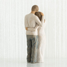 Willow Tree Home figure, standing man in blue jeans, represents partnership and family