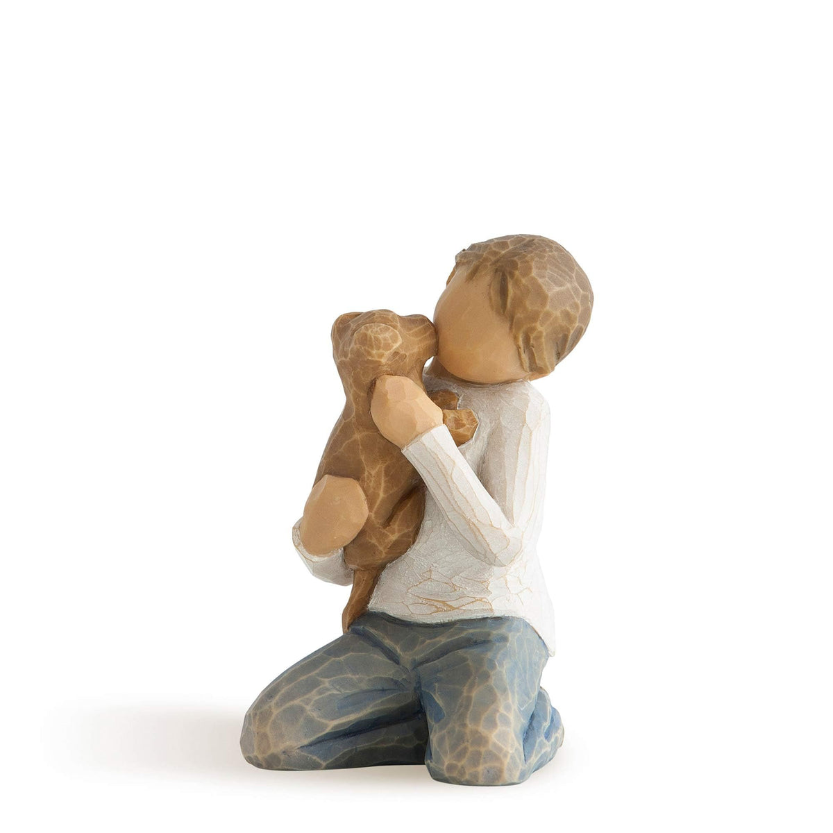 Willow Tree Kindness figure: boy in blue jeans holding a dog, ideal for family display