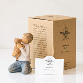 Figure packaged in a ready-to-gift box for shelf or mantel display