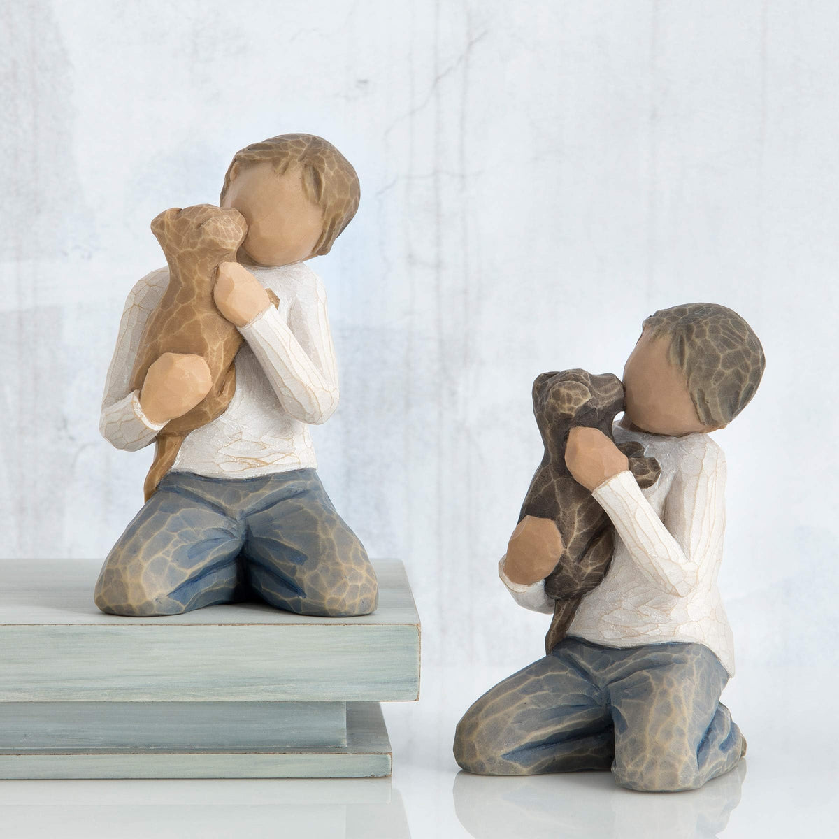 Origin and artistry: Susan Lordi carving and hand-painted Willow Tree piece