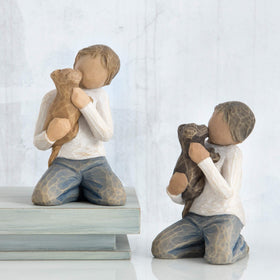 Origin and artistry: Susan Lordi carving and hand-painted Willow Tree piece