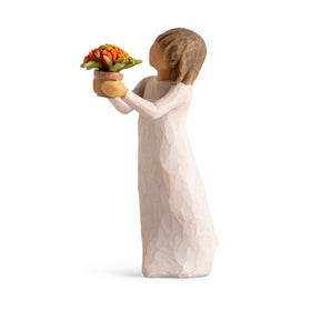 Willow Tree Little Things figure holding a milkweed plant for monarch butterfly supporters.