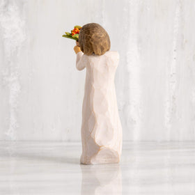 Willow Tree hand-painted resin figure close-up showing fine craftsmanship.