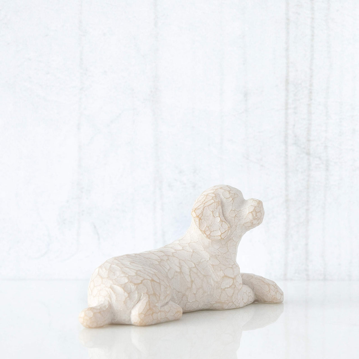 Willow Tree Love My Dog displayed on a shelf, perfect for mantel or desk decor.