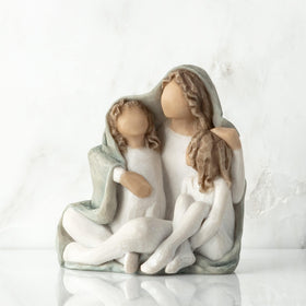 Willow Tree hand-painted mother and two children scene enhances shelf appeal.