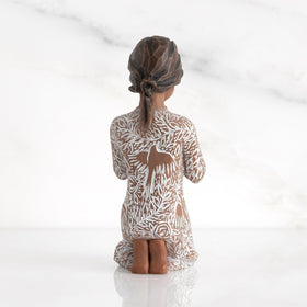 Willow Tree prayer figure in cream dress, suited for sympathy gifts.