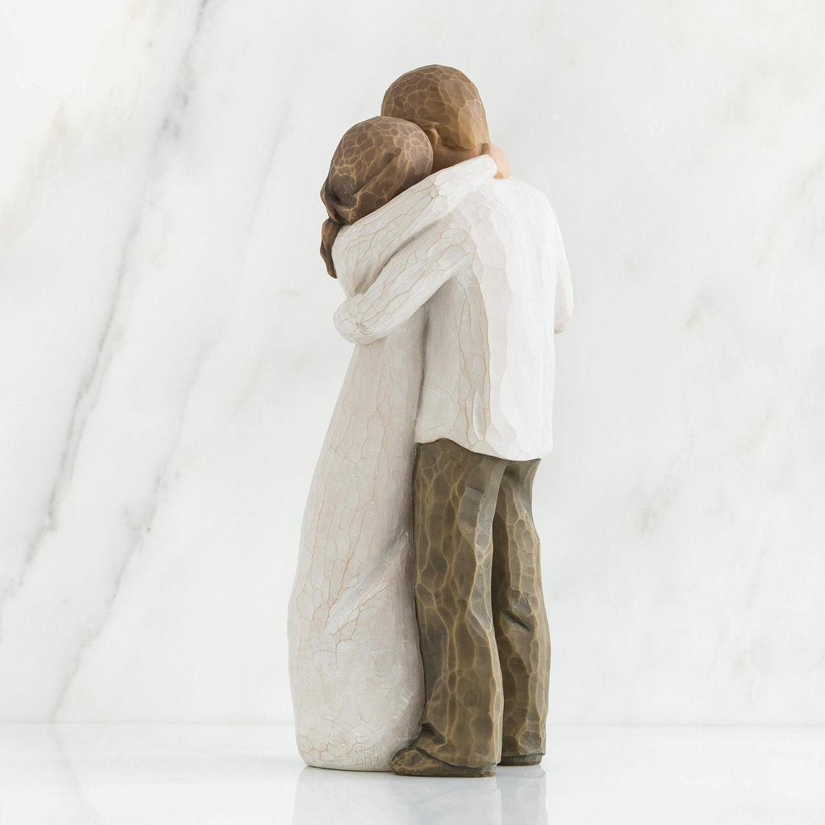 Willow Tree Promise cream-shirt man figure balances the sculpture beautifully.