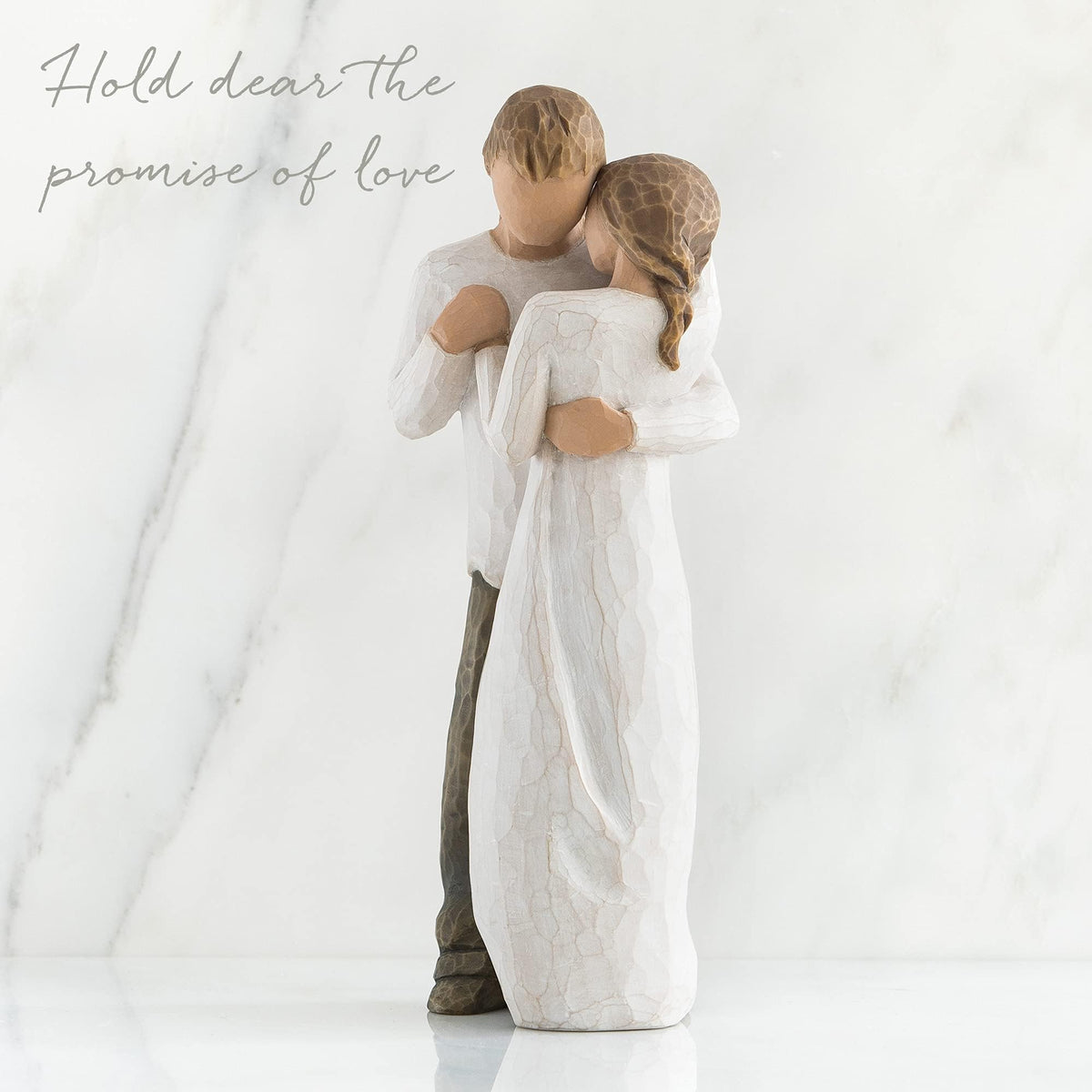 Willow Tree Promise hand-painted resin figure demonstrates artisan craftsmanship.