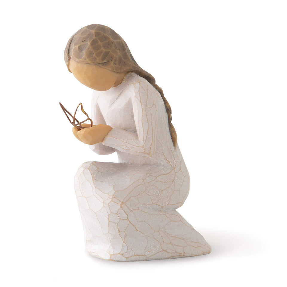 Willow Tree Quiet Wonder butterfly on hand, symbolizing hopeful moments